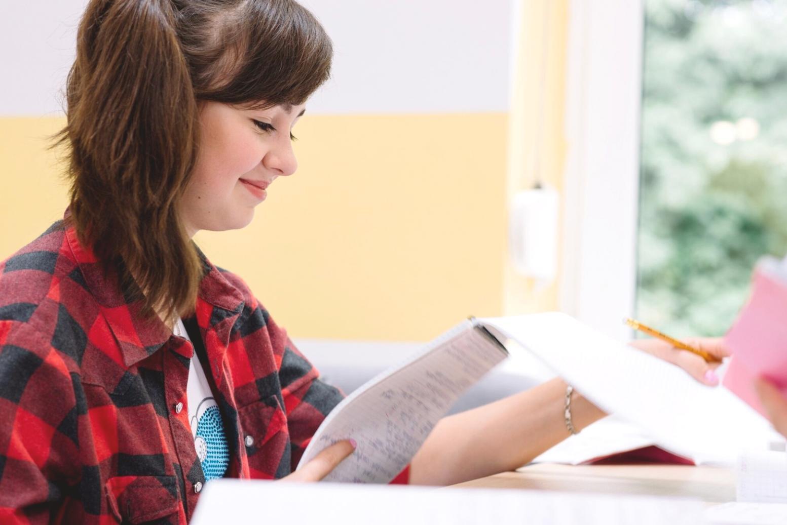 Professional analyzing financial documents and charts